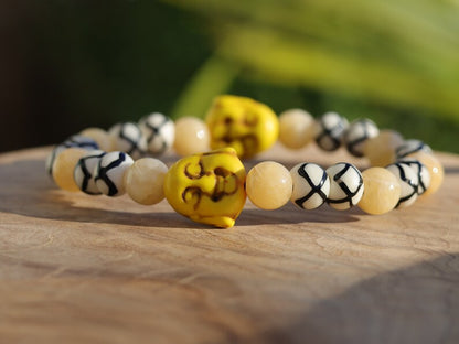 Topaz Jade Beads bracelet with Howlite bead Buddha yellow. absorb, and clear the constant stream of chatter from the mind. Haḍīāṁ