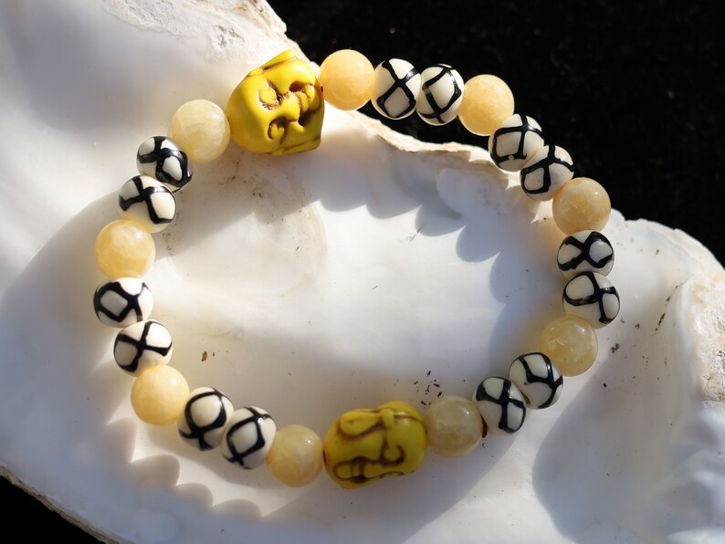 Topaz Jade Beads bracelet with Howlite bead Buddha yellow. absorb, and clear the constant stream of chatter from the mind. Haḍīāṁ