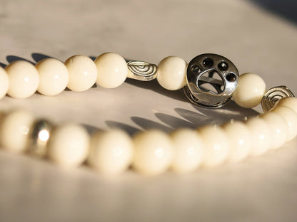 Pure white stone Tridacna bracelet with 925 Sterling Silver Pet Bead. With Sterling Silver Stardust Round Beads. Powerbeads to enhance