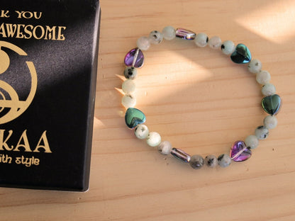 Natural Sesame Jasper/Kiwi Jasper 7mm bracelet combined with Heart Shaped Beads.  Believed to have grounding and calming properties.