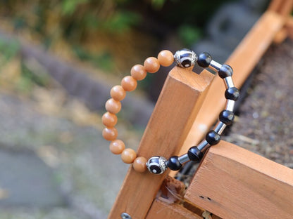 Natural Stone Striped Black Lace Agate bracelet with metal bead tube beads and Tibetan Style dZi Beads. Wajakaa, one of a kind