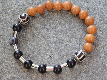 Natural Stone Striped Black Lace Agate bracelet with metal bead tube beads and Tibetan Style dZi Beads. Wajakaa, one of a kind