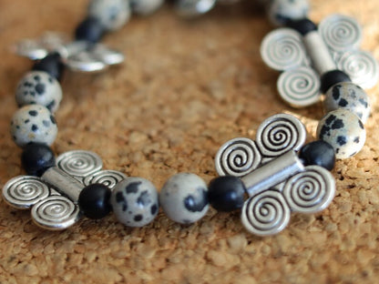 Dalmatian Jasper bracelet combined with wood and Butterfly spacers. o transform outworn thinking patterns