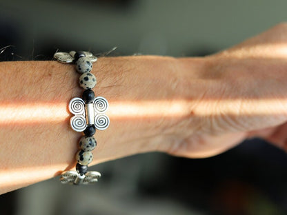 Dalmatian Jasper bracelet combined with wood and Butterfly spacers. o transform outworn thinking patterns