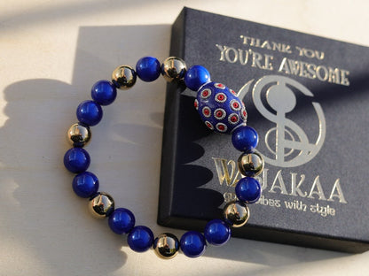 Handmade Indonesia Beads with 3D Miracle beads and a  mirrored top layer. ook into the bead, it looks like there is still a bead in it.