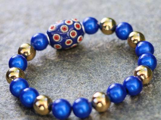 Handmade Indonesia Beads with 3D Miracle beads and a  mirrored top layer. ook into the bead, it looks like there is still a bead in it.