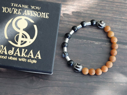 Natural Stone Striped Black Lace Agate bracelet with metal bead tube beads and Tibetan Style dZi Beads. Wajakaa, one of a kind