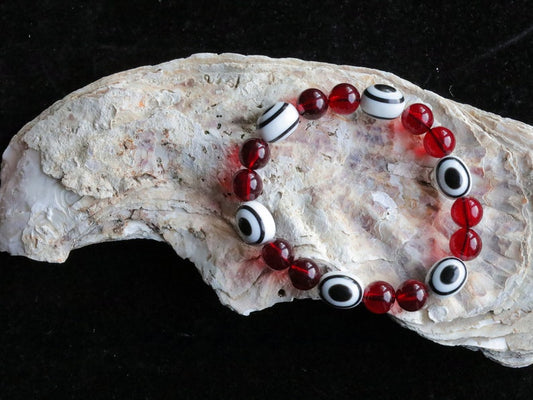 One of a kind Mexico red blood Amber beads Certified 8mm combined with black and white glass beads.