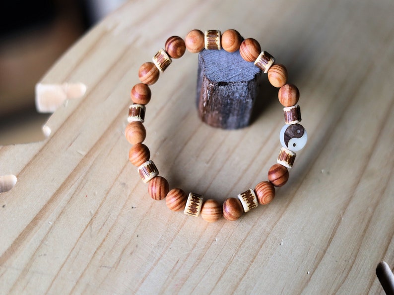 Lightweight unique combination Raja Kayu with Edited wooden beads discs and carved Yin Yang. The Supreme King in the forest