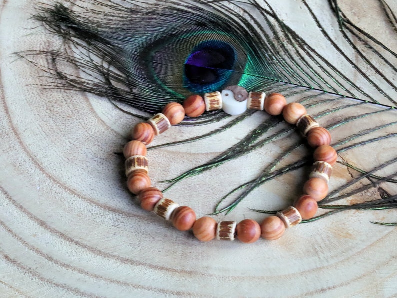 Lightweight unique combination Raja Kayu with Edited wooden beads discs and carved Yin Yang. The Supreme King in the forest