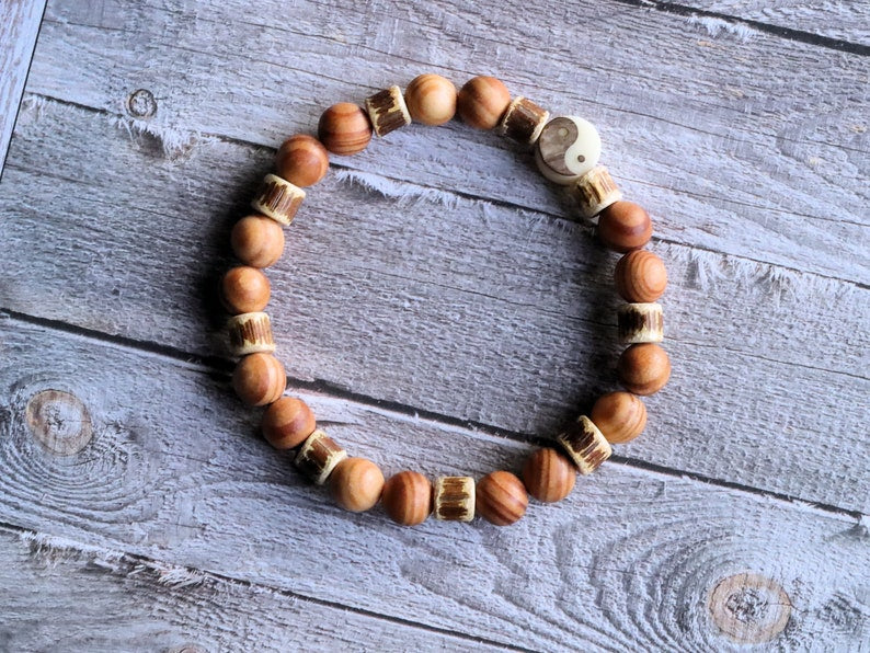 Lightweight unique combination Raja Kayu with Edited wooden beads discs and carved Yin Yang. The Supreme King in the forest