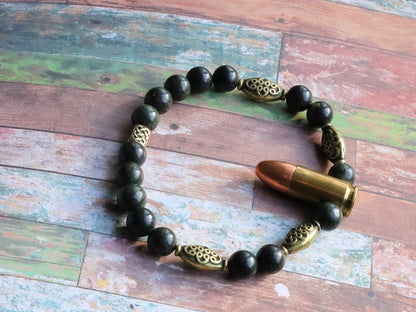 Uncommon real 9mm Luger Bullet bracelet with Strong Serpentine. Bullet Name Meaning: Its Powerful Symbolism, Destiny and Luck.