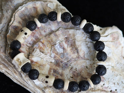 Handmade Tribal Fish-spine-bone bracelet with Lava, coconut and Great authentic & detailed hand-carved prayer beads, made of smoked Oxbone.