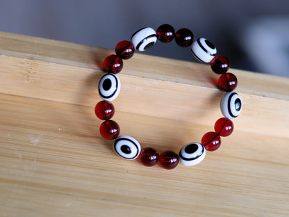 One of a kind Mexico red blood Amber beads Certified 8mm combined with black and white glass beads.