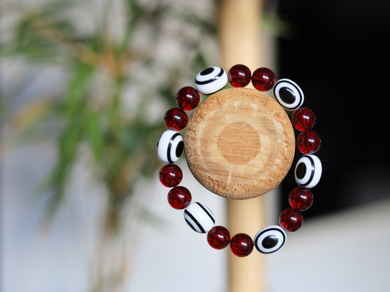 One of a kind Mexico red blood Amber beads Certified 8mm combined with black and white glass beads.
