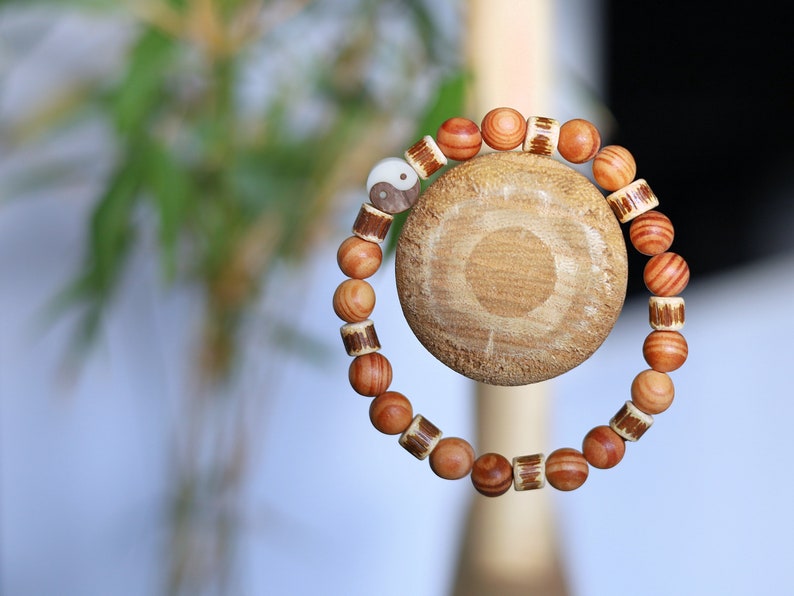 Lightweight unique combination Raja Kayu with Edited wooden beads discs and carved Yin Yang. The Supreme King in the forest