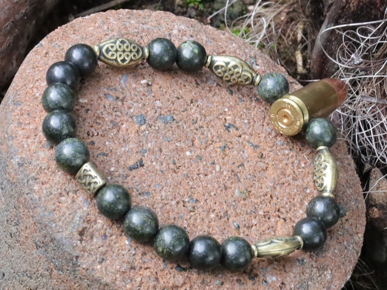 Uncommon real 9mm Luger Bullet bracelet with Strong Serpentine. Bullet Name Meaning: Its Powerful Symbolism, Destiny and Luck.
