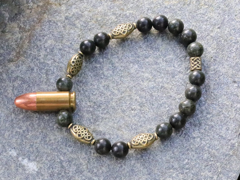 Uncommon real 9mm Luger Bullet bracelet with Strong Serpentine. Bullet Name Meaning: Its Powerful Symbolism, Destiny and Luck.