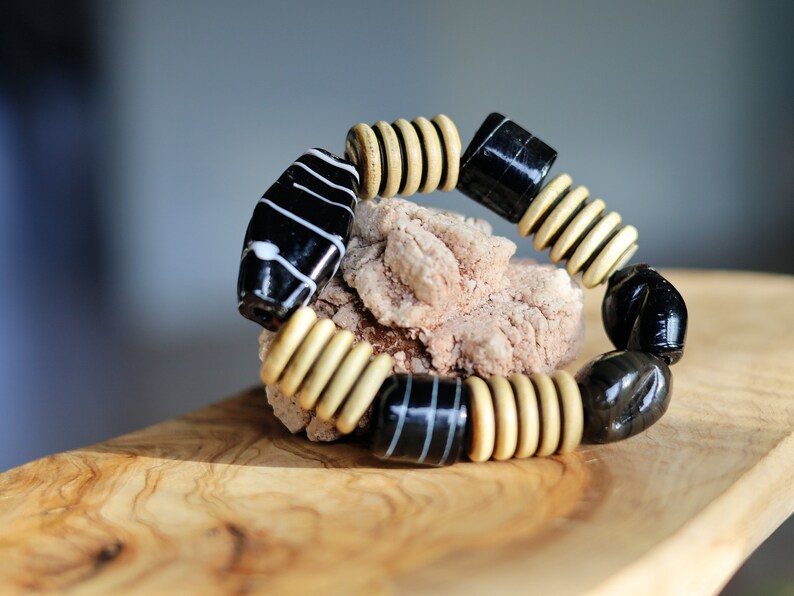 Big beautiful Horn gemstone bracelet jewelry with clay beads in different models. Bone jewelry is fashionable, suited all kinds of occasions