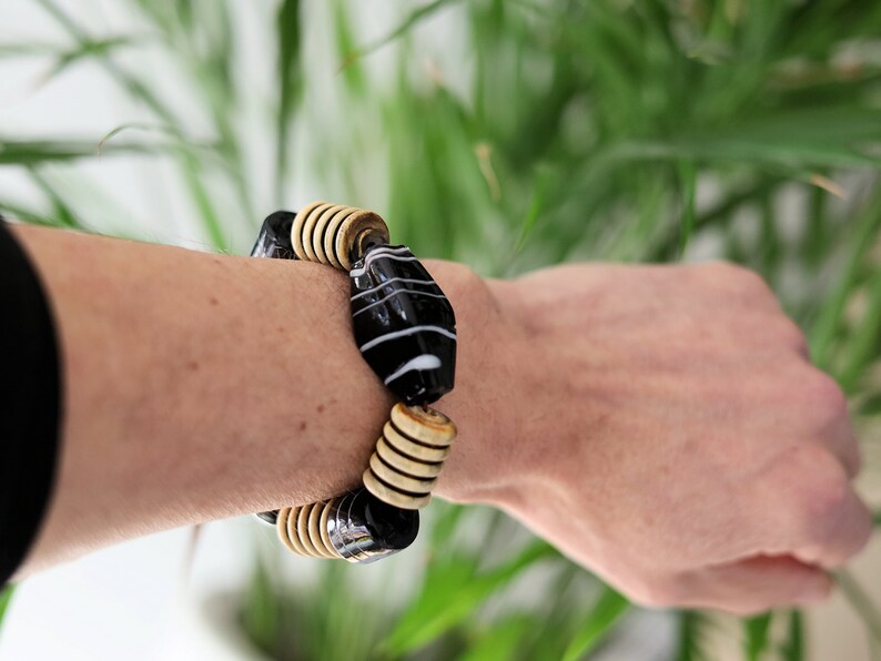 Big beautiful Horn gemstone bracelet jewelry with clay beads in different models. Bone jewelry is fashionable, suited all kinds of occasions
