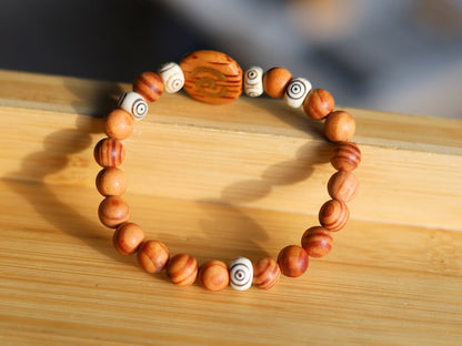 Lightweight unique combination Matte Raja Kayu Wood and Spiral Yak Bone with Spiral brown wood. Symbol of purity, strength and courage
