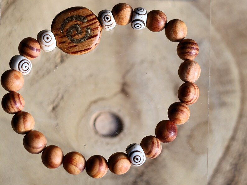 Lightweight unique combination Matte Raja Kayu Wood and Spiral Yak Bone with Spiral brown wood. Symbol of purity, strength and courage