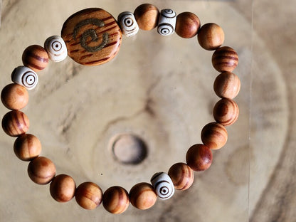 Lightweight unique combination Matte Raja Kayu Wood and Spiral Yak Bone with Spiral brown wood. Symbol of purity, strength and courage