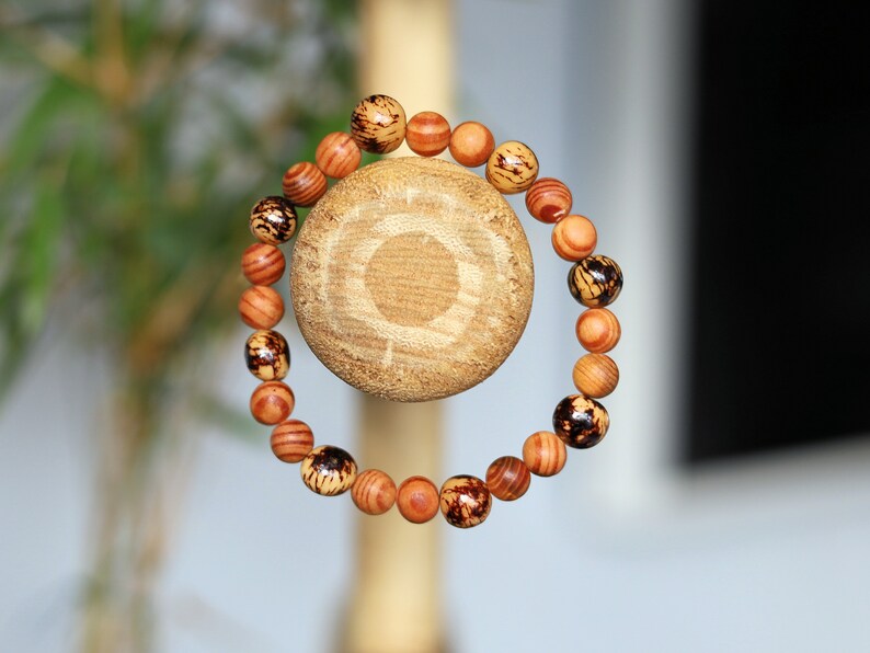 Lightweight rare combination Matte Raja Kayu Wood and muruci beads also come from our purveyor the palm tree. Free offer gift wrapping