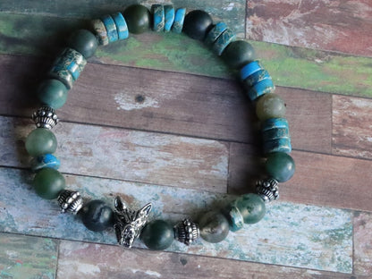 Heishi and Matte Moss Agate Beads bracelets combined with a Wolf Head. Unique, handmade symbolic jewelry that reflects your style & beliefs.