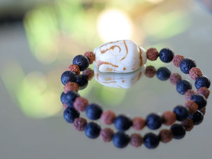 Beautiful large bead of real magnesite Buddha with Round Rudraksha beads and Lava stones. wonderful for calming the emotions