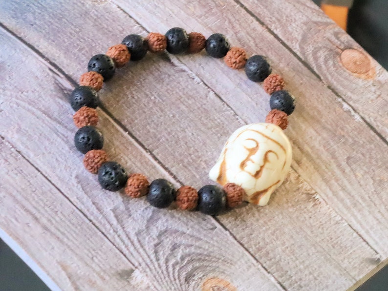 Beautiful large bead of real magnesite Buddha with Round Rudraksha beads and Lava stones. wonderful for calming the emotions