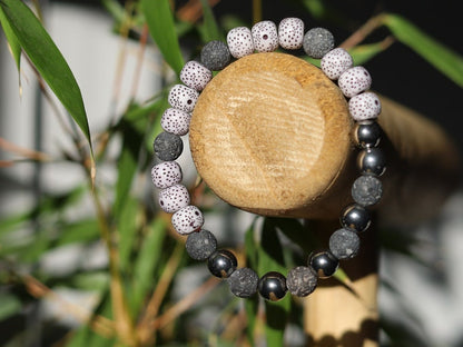 Starmoon Bodhi Barrel bracelet with Lava stones and Hematite crystal. represent rebirth and shedding unneeded layers of emotional attachment