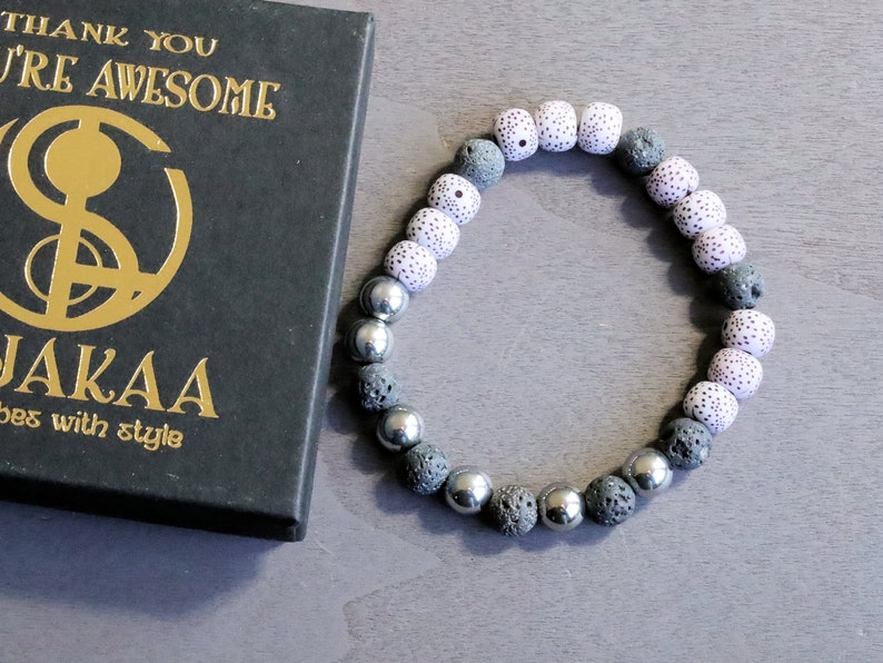 Starmoon Bodhi Barrel bracelet with Lava stones and Hematite crystal. represent rebirth and shedding unneeded layers of emotional attachment