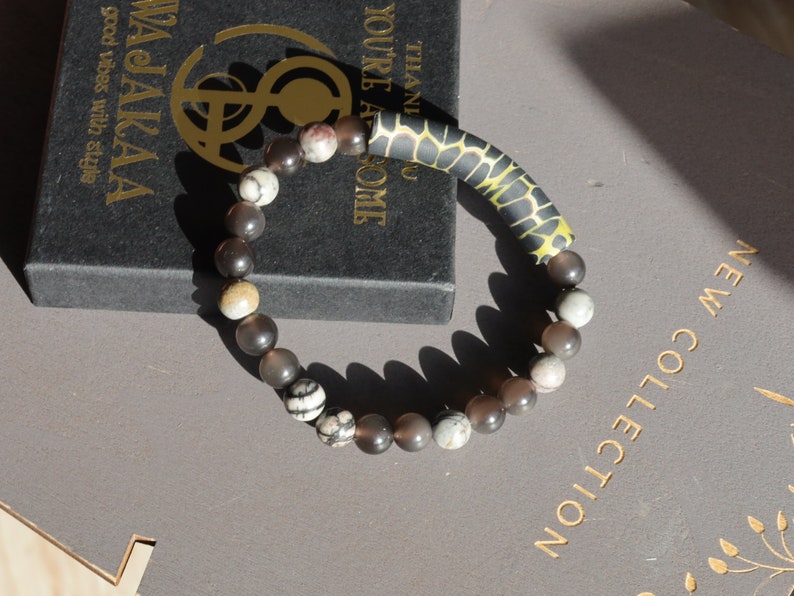 Natural Ice Obsidian Beads with Black silk stone and beautiful large curved Fimo Clay bead. to promote self-control and inner tranquility