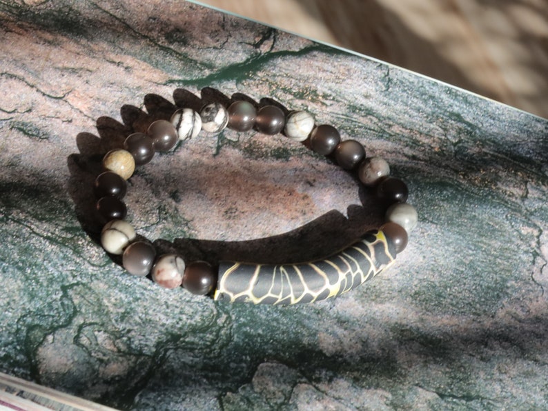 Natural Ice Obsidian Beads with Black silk stone and beautiful large curved Fimo Clay bead. to promote self-control and inner tranquility