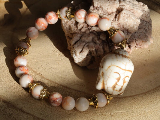 Beautiful large bead of real magnesite: Buddha combined with The healing properties of Netstone. Meaningful & symbolic merchandise
