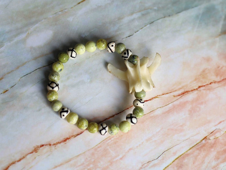 Rare Real Fox Vertebra combined with Natural Yellow Turquoise Jasper Beads. And Wavy Line & Dots Bone Beads.