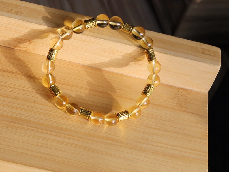 Citrine combined with Antique Bronze Tone Spacer Beads. ENERGIZING CITRINE BRACELET. unlocking our truest desires