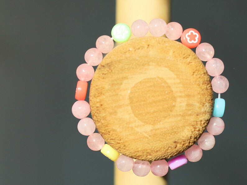 The Bāla Sagrahi Kids Collection. Children's Size 6 mm Rose Quartz Bracelet with kids acryl beads symbols. Gifts for kids!