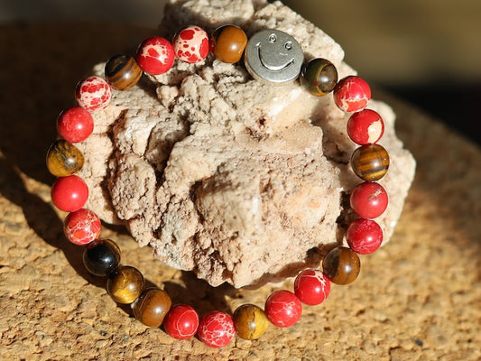 The Bāla Sagrahi Kids Collection. Children's Size Red Emperor Jasper 6 mm Gemstone Bracelet with Tiger eye and Happy Face Bead.