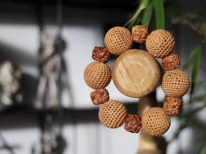 Particularly large Walnut Hand carved Bracelet with Crochet bead light brown. A larger, crocheted bead in light brown.