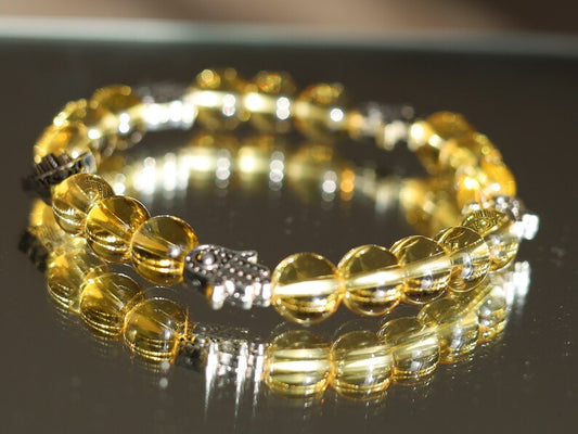 Citrine is a master of one's creativity center combined with Tibetan Style Alloy Hamsa Hand. ENERGIZING CITRINE BRACELET