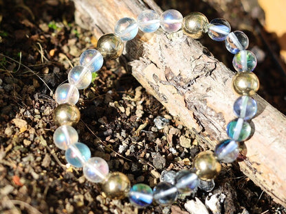Mystic Aura Quartz Beads with Angel Aura and Metallook Beads Gold. the path of life becomes clear again and the stone gives joy, energy