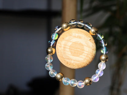 Mystic Aura Quartz Beads with Angel Aura and Metallook Beads Gold. the path of life becomes clear again and the stone gives joy, energy