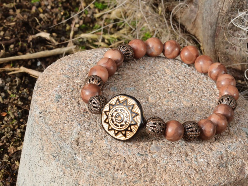Tribal Totem Sun with  Zebra Jaspers beads and  Filigree in Bronze (dark Antique Copper) tone beads. to stimulate...