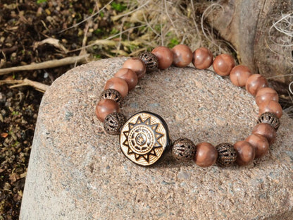 Tribal Totem Sun with  Zebra Jaspers beads and  Filigree in Bronze (dark Antique Copper) tone beads. to stimulate...