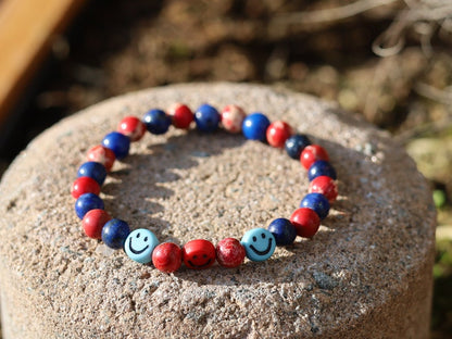 The Bāla Sagrahi Kids Collection. Children's Size Red Emperor Jasper 6 mm Gemstone Bracelet with Lapis Lazuli and Emoji Beads