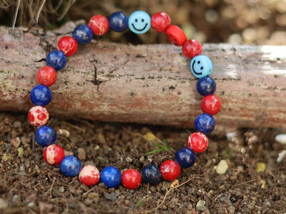 The Bāla Sagrahi Kids Collection. Children's Size Red Emperor Jasper 6 mm Gemstone Bracelet with Lapis Lazuli and Emoji Beads