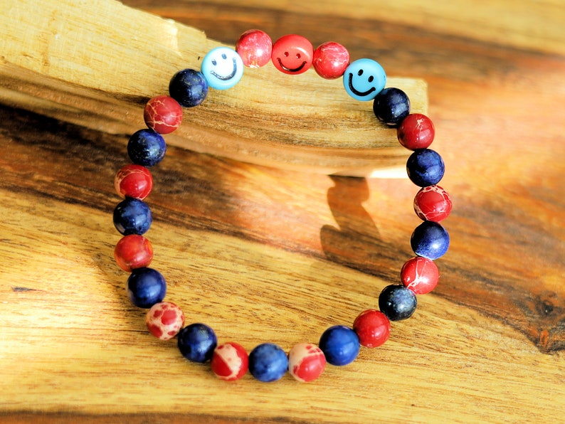 The Bāla Sagrahi Kids Collection. Children's Size Red Emperor Jasper 6 mm Gemstone Bracelet with Lapis Lazuli and Emoji Beads