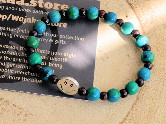 The Bāla Sagrahi Kids Collection. Children's Size Chrysocolla 6 mm Gemstone Bracelet with 4mm Red Garnet and Happy Face Bead.